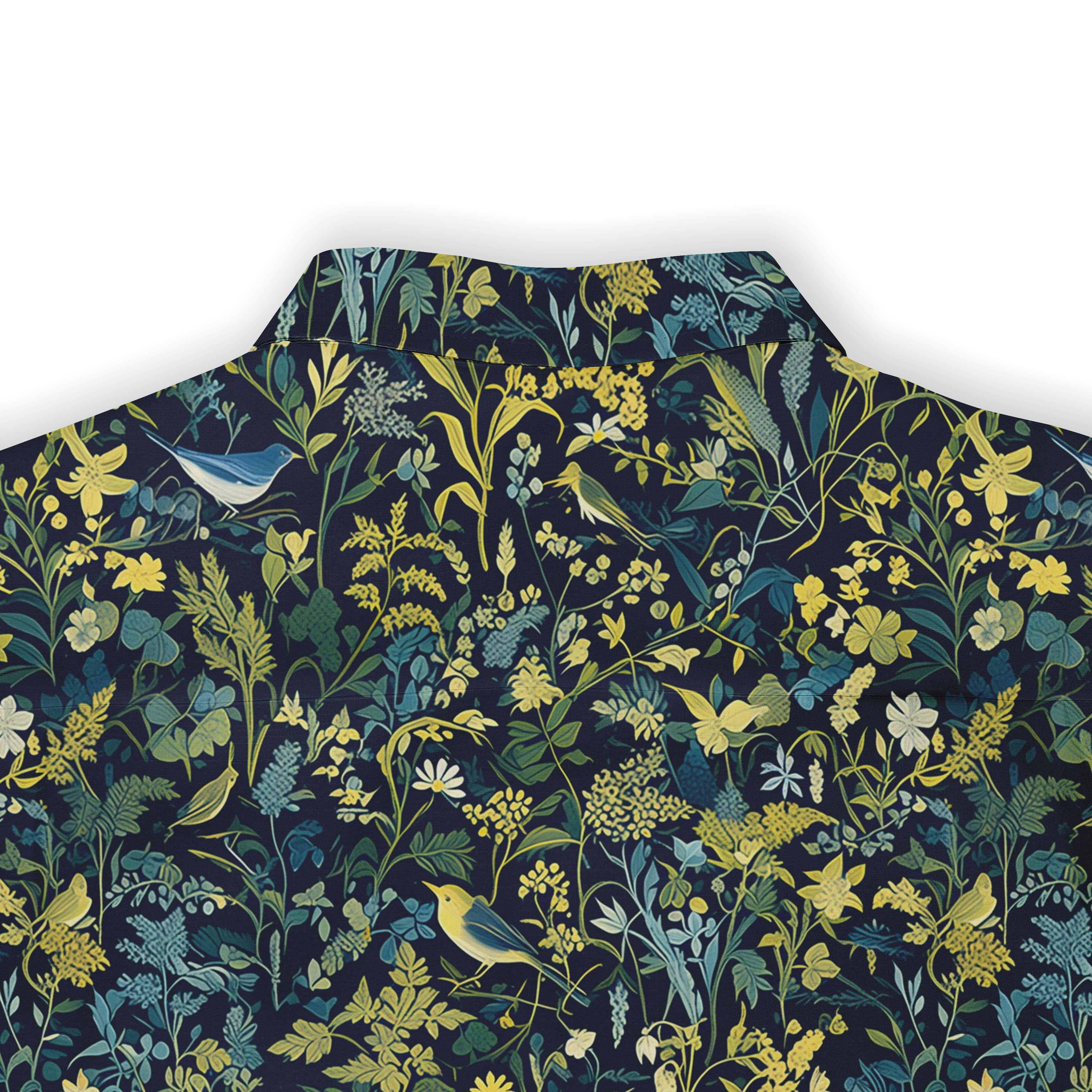 Short-sleeve shirt with an enchanted forest design, blending leaves and birds.