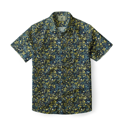  A dark short-sleeve shirt with intricate green and blue floral and bird patterns.