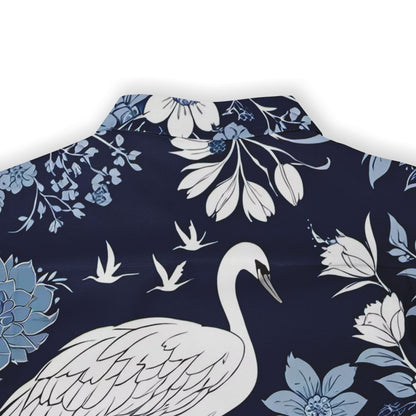 Elegant crane design on a shirt with detailed floral accents, inspired by nature.