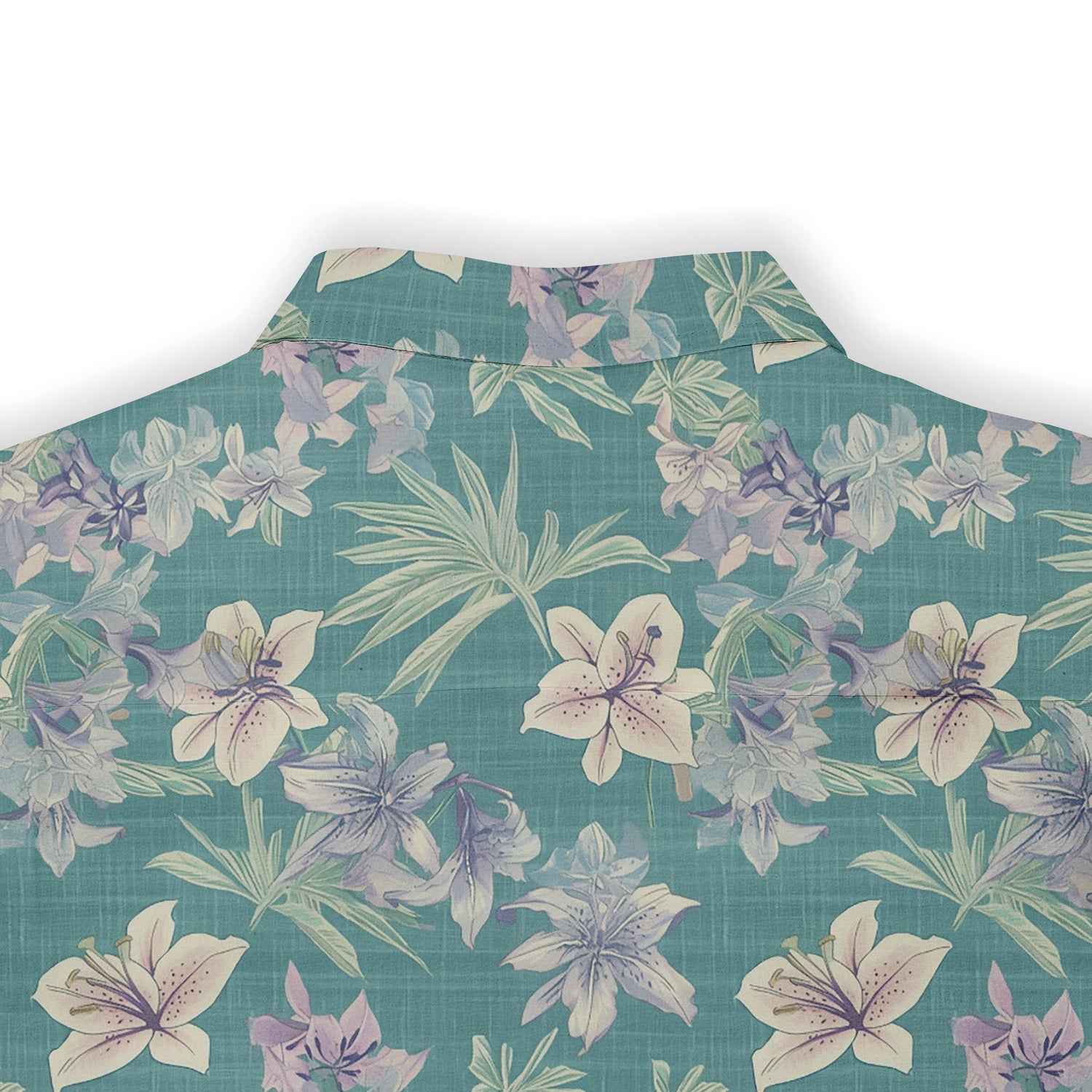 Elegant shirt with intricate flowers and leaves in soft colors.