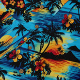 Silhouetted palm trees against a sunset on a Hawaiian shirt.