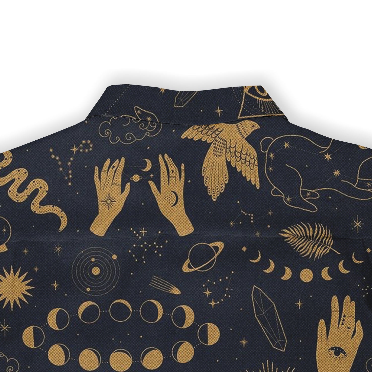 Back view of a shirt showcasing gold celestial and mystical designs on dark fabric, featuring hands, moons, and other cosmic symbols.