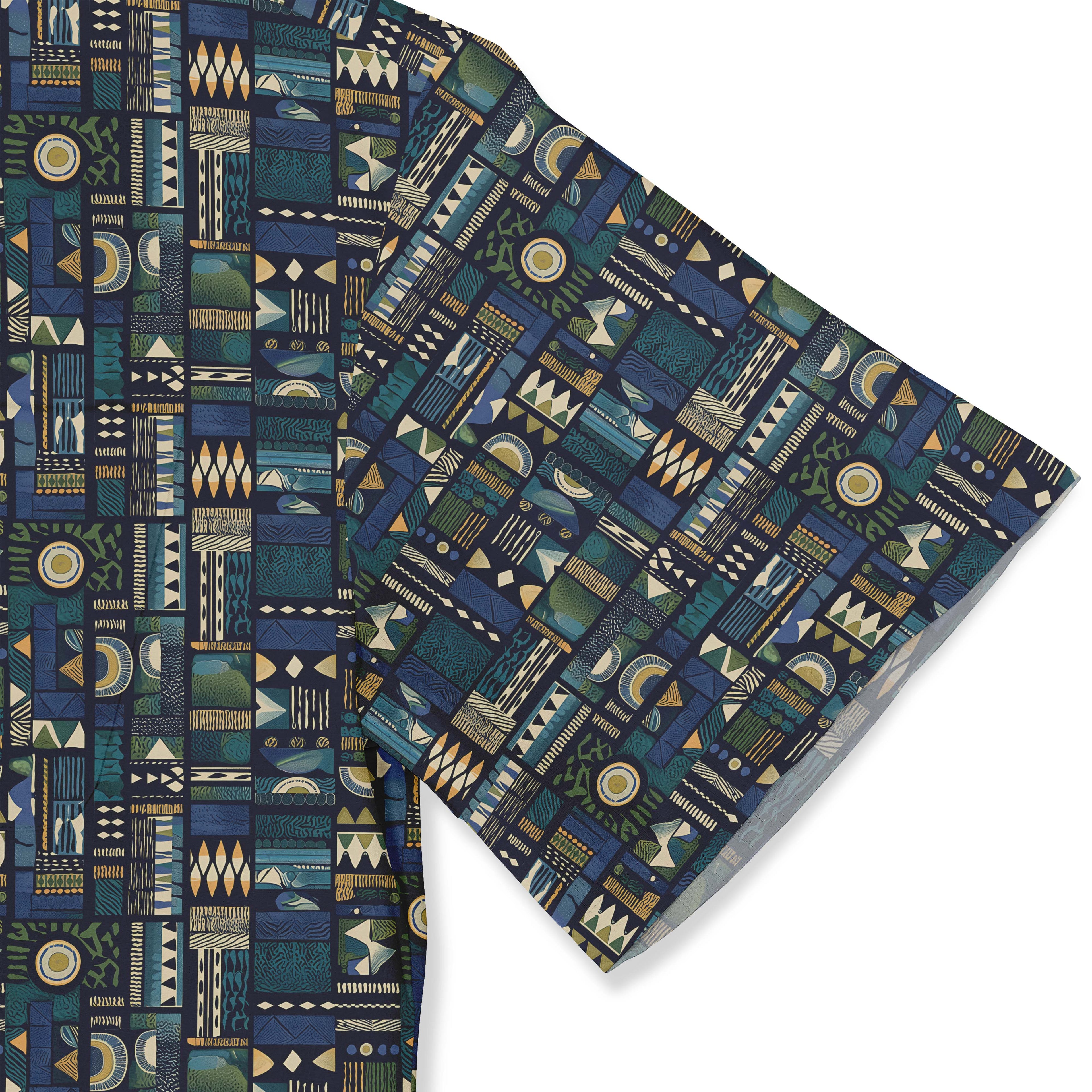 A short-sleeved shirt with an intricate geometric pattern in deep blues, greens, and golds. sleeve close-up