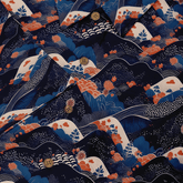 Shirt with serene mountain and river scenes in blue and white close-up