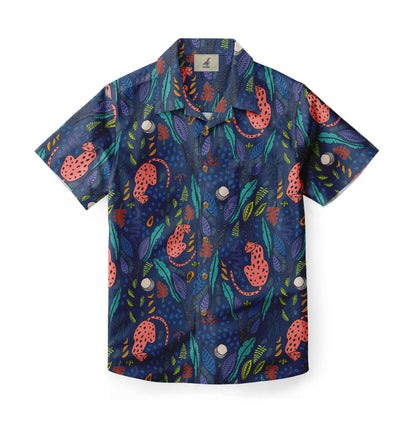 Shirt with a vibrant pattern of pink leopards, colorful leaves, and abstract shapes on a deep blue background.