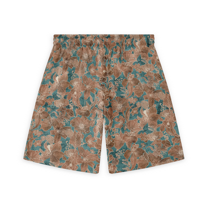 Back view of shorts with a detailed floral pattern in brown and teal tones.