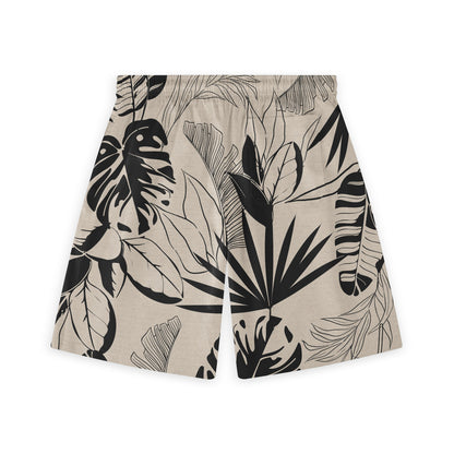 Shorts showcasing a striking black and beige tropical leaf pattern, featuring an array of large, stylized leaves arranged dynamically for a bold, monochrome look.